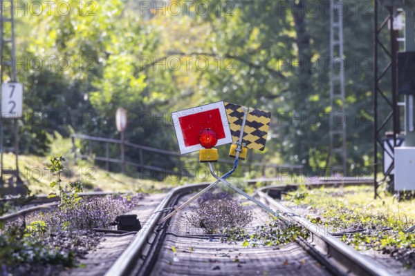 Track closed. The signal is called Sh2 (protective stop) . The stop sign is placed in front of