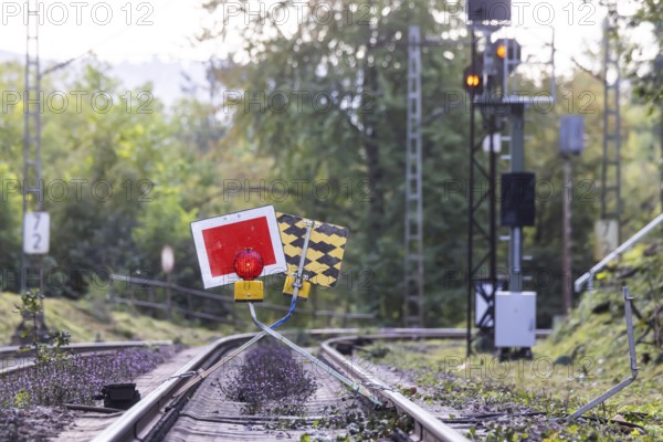 Track closed. The signal is called Sh2 (protective stop) . The stop sign is placed in front of