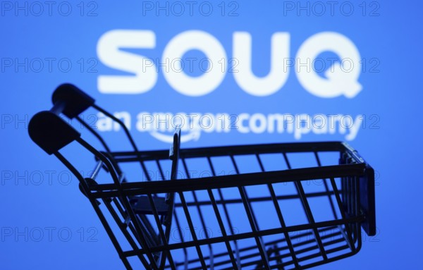 Dhaka, Bangladesh- 03 July 2025: Silhouette of a shopping cart in front of the Souq logo,