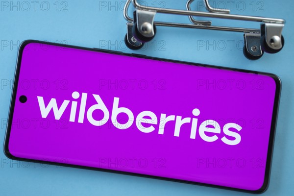 Dhaka, Bangladesh- 03 July 2025: Smartphone screen showing the Wildberries logo with shopping cart