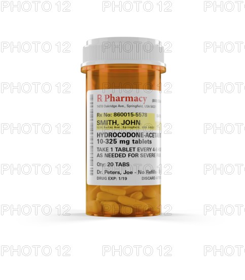Hydrocodone prescription medicine bottle and pills isolated on a white background. the label is