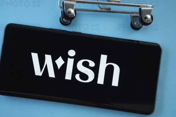 Dhaka, Bangladesh- 03 July 2025: Smartphone screen showing the Wish logo with shopping cart wheels