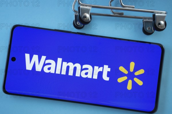 Dhaka, Bangladesh- 03 July 2025: Smartphone screen showing the Walmart logo with shopping cart