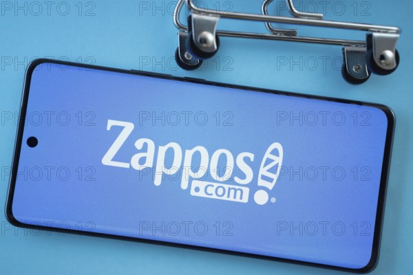 Dhaka, Bangladesh- 03 July 2025: Smartphone screen showing the Zappos logo with shopping cart