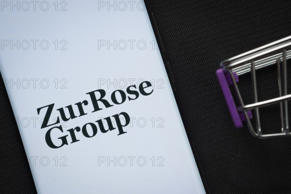 Dhaka, Bangladesh- 03 July 2025: A smartphone displaying the Zur Rose Group logo next to a
