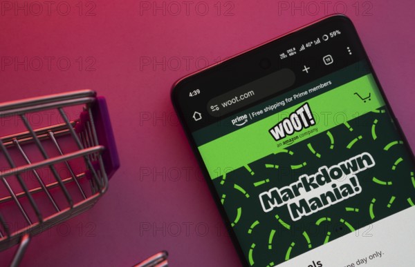 Dhaka, Bangladesh- 23 June 2025: A smartphone displaying the Woot website with a shopping cart is