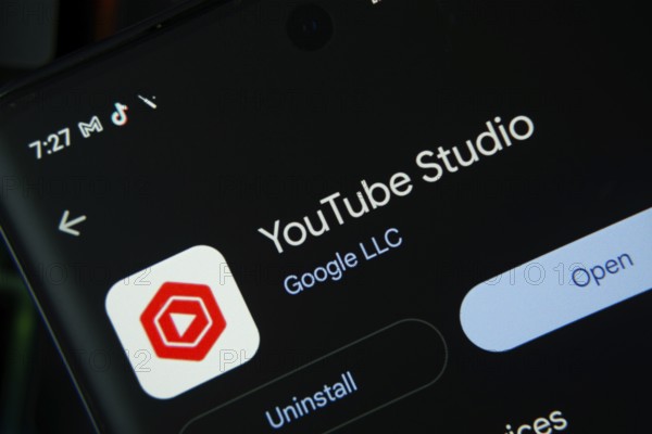 Dhaka, Bangladesh- 27 July 2025: Screen displaying youtube studio app with open and uninstall