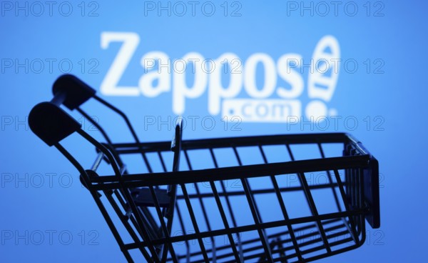 Dhaka, Bangladesh- 03 July 2025: Silhouette of a shopping cart in front of the Zappos logo,