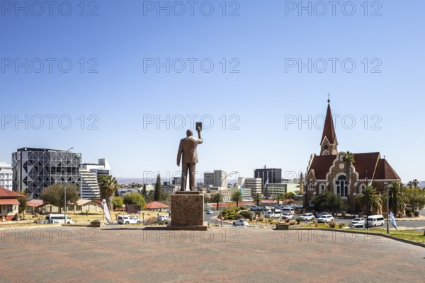 The bronze statue of Dr. Sam Nujoma and Christuskirche is a historic Lutheran church in Windhoek,