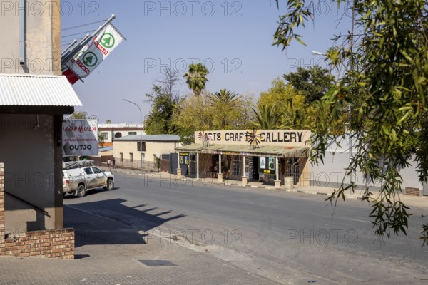 Street view of a modern building with a restaurant or café entrance in Outjo, Namibia 12 Augusto