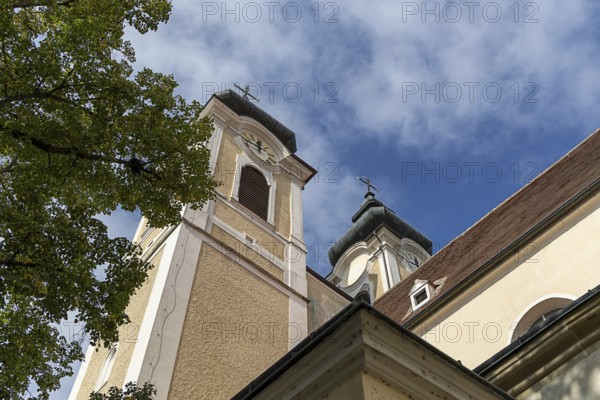 Baroque church towers with clocks against a blue sky, Gothic architectural details, St Stephan's