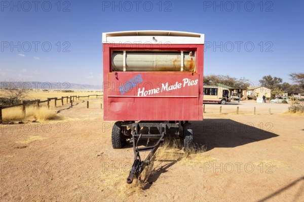 Solitaire's car graveyard in Namibia - 27 August, 2025: features rusted vintage cars near small