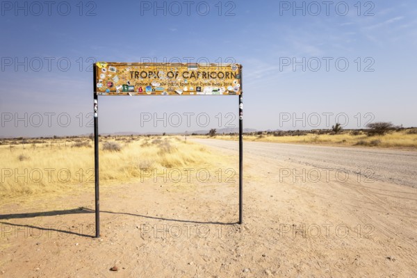 Namibia- 25 August, 2025: Road sign marking the Tropic of Capricorn in Namibia's dry, sandy