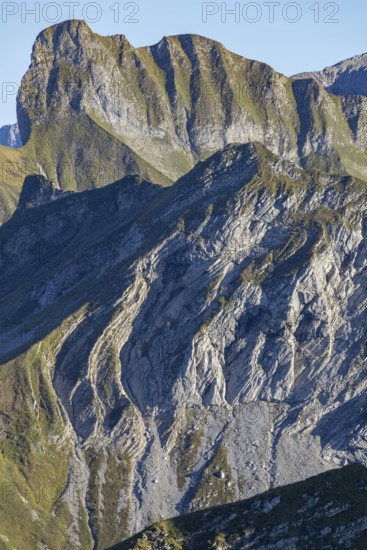 Layer folds in limestone, behind it the Schneck, 268m, Daumengruppe, Allgäu Alps, Allgäu, Bavaria,