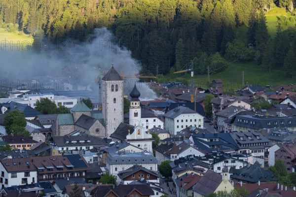 View of a burning building in the town centre of San Candido, San Candido, Val Pusteria, Sesto