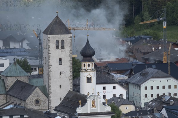 View of a burning building in the town centre of San Candido, San Candido, Val Pusteria, Sesto