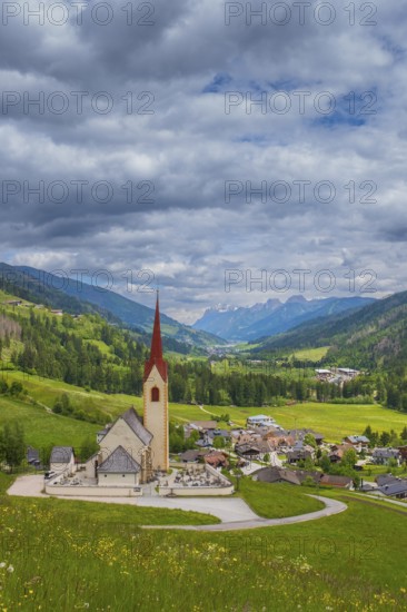 View of the church of Winnebach with the valley behind it, San Candido, Val Pusteria, Dolomites,