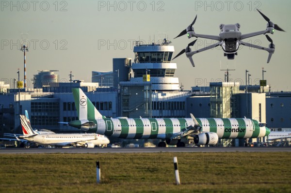 Symbolic image, photomontage, reconnaissance, spying with drones here at an airport, critical