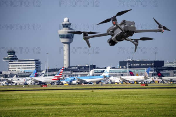 Symbolic image, photomontage, reconnaissance, spying with drones here at an airport, critical