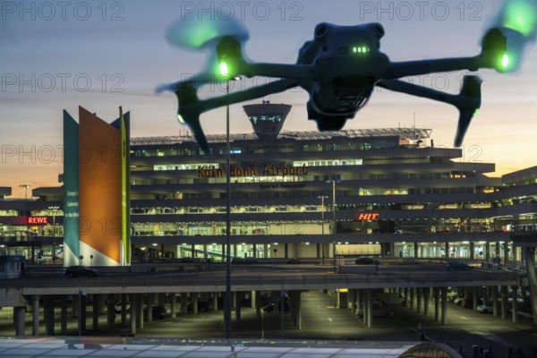 Symbolic image, photomontage, reconnaissance, spying with drones here at an airport, critical