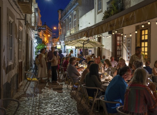 Gastronomy, restaurants in Tavira, old town, partly streets, alleys are closed and serve as