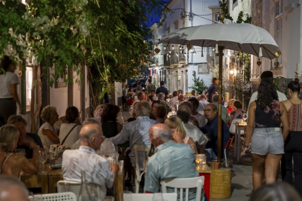Gastronomy, restaurants in Tavira, old town, partly streets, alleys are closed and serve as