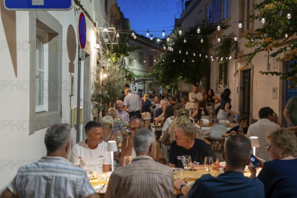 Gastronomy, restaurants in Tavira, old town, partly streets, alleys are closed and serve as