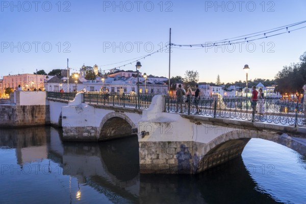The seven-arched bridge over the Rio Gilão, in Tavira, old town, in the east of the Algarve,