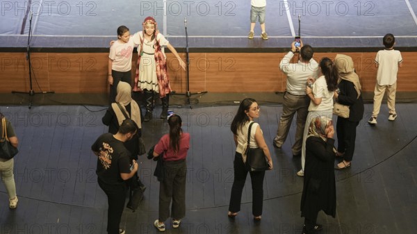 Audience members gather inside the theater before the start of the Fire of Anatolia show in