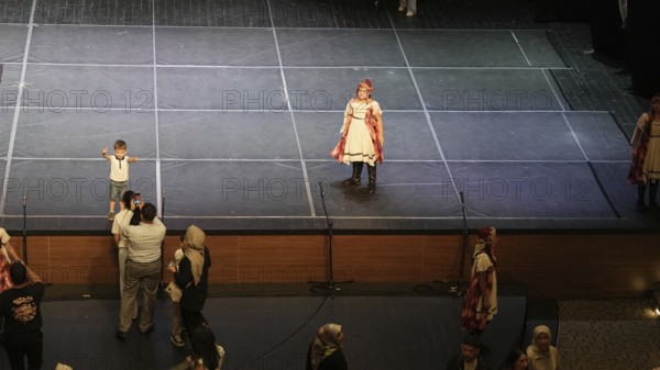 Audience members gather inside the theater before the start of the Fire of Anatolia show in