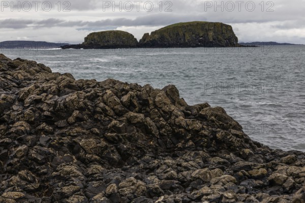 Rocky coast, offshore islands, Ballintoy Harbour, Causeway Coastal Route, Antrim, Northern Ireland,
