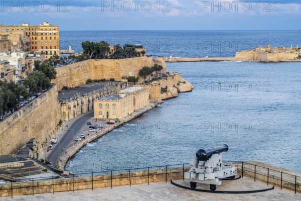 Seafront view of historic La Valletta with Lower Barrakka gardens, taken from Upper Barrakka
