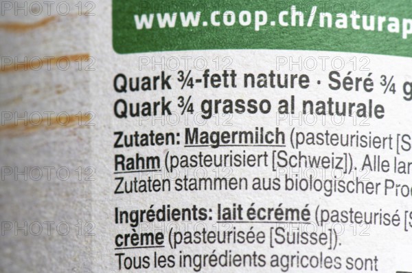List of ingredients on a packet of quark. Focus on the ingredient skimmed milk and cream
