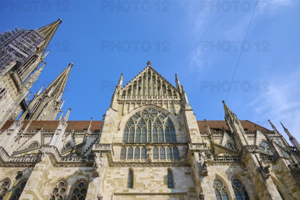 Imposing Gothic cathedral with striking towers under a clear sky, St Peter's Cathedral, Regensburg,