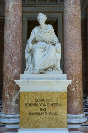 Marble statuette of Ludwig I in a sitting pose between red columns, Walhalla, Donaustauf,