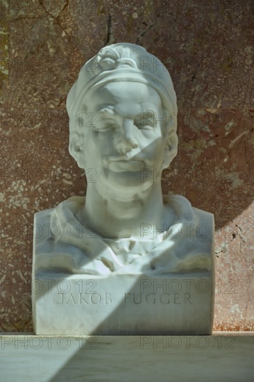 White marble bust of Jakob Fugger in front of a reddish wall, Walhalla, Donaustauf, Regensburg,