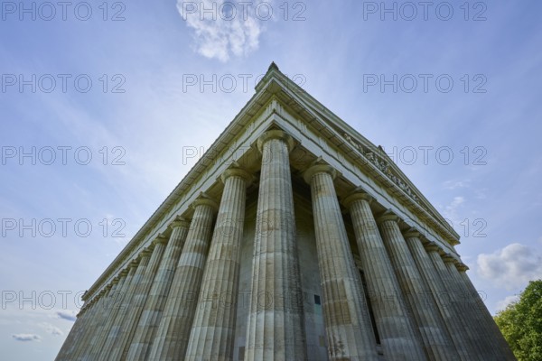 Impressive columned building that stands out against a light-flooded sky, Walhalla, Donaustauf,