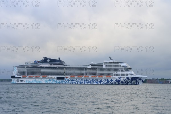 A cruise ship, MSC Euribia, the MSC on the sea under a cloudy sky, Heikendorf, Plön district, Kiel