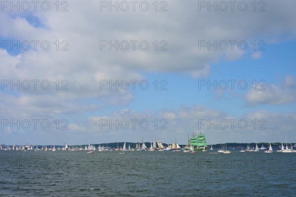 Regatta of sailing boats on the ocean on a cloudy day, Windjammer Parade Kiel 2025, Heikendorf,