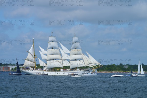 An impressive tall ship Gorch Fock with white sails off the coast, Windjammer Parade Kiel 2025,
