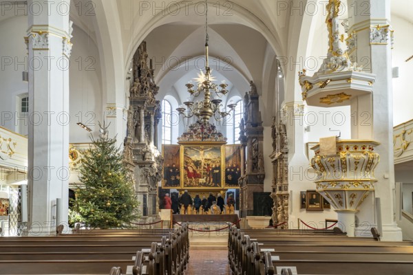 Interior of the Herderkirche with the altarpiece Christ on the Cross by Lucas Cranach in Weimar,