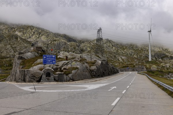 Road junction at the top of the Gotthard Pass, junction to Milan and Bellinzona and to Lucerne and