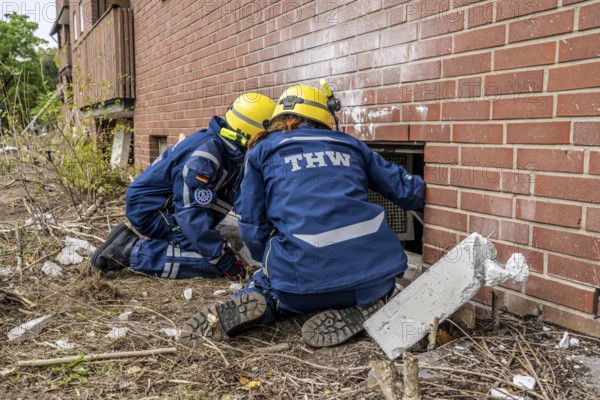 Rescue and recovery of people after a drone attack on a residential building in a civil defence