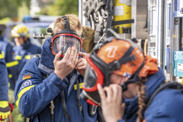 Civil defence exercise scenario, after a drone attack on a residential area, emergency services