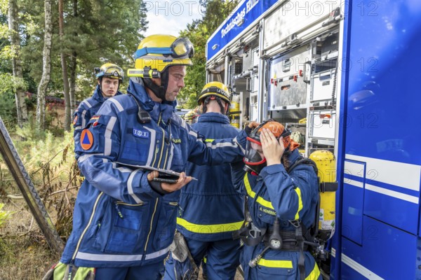 Civil defence exercise scenario, after a drone attack on a residential area, emergency services