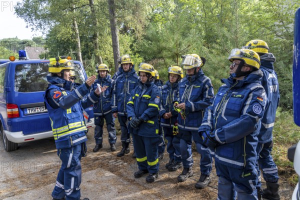 Civil defence exercise scenario, after a drone attack on a residential area, emergency services