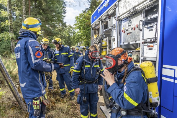 Civil defence exercise scenario, after a drone attack on a residential area, emergency services