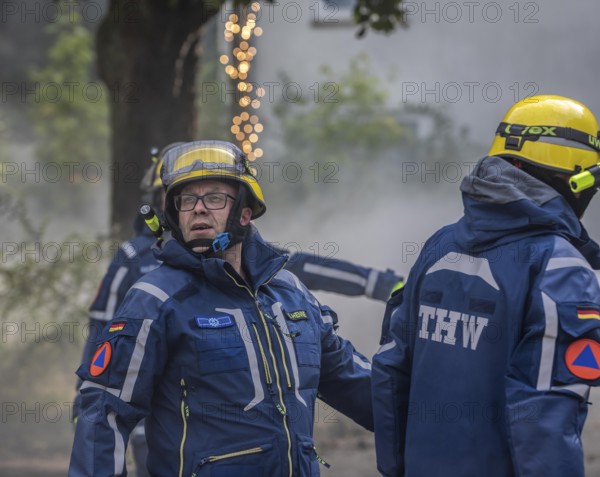 Civil defence exercise scenario, after a drone attack on a residential area, emergency services