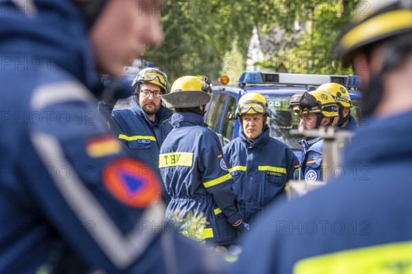 Civil defence exercise scenario, after a drone attack on a residential area, emergency services