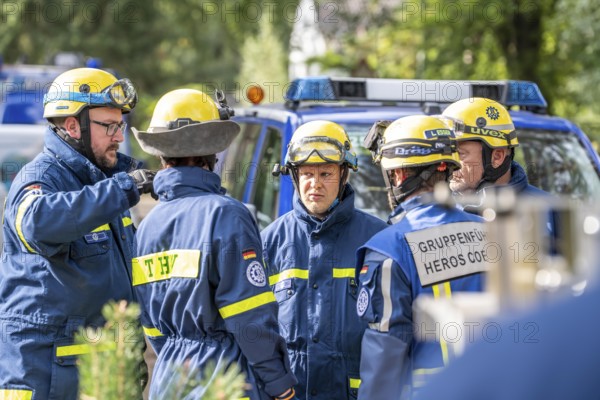 Civil defence exercise scenario, after a drone attack on a residential area, emergency services